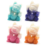 luminous Maneki Neko cat carvings