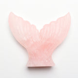 Mermaid tail carvings
