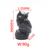 Various owl carvings