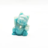 luminous Maneki Neko cat carvings