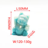 luminous Maneki Neko cat carvings