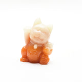 luminous Maneki Neko cat carvings