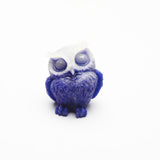 Luminous owl carvings