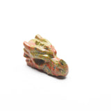 Small dragon head carvings