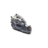 Small dragon head carvings