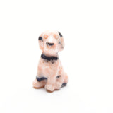 Various small dog carvings
