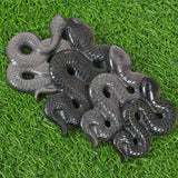 Obsidian snake carving