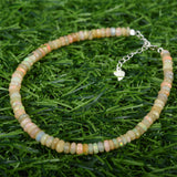 faced drum beads rainbow opal brecelet