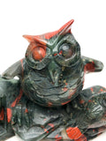African bloodstone owl carving