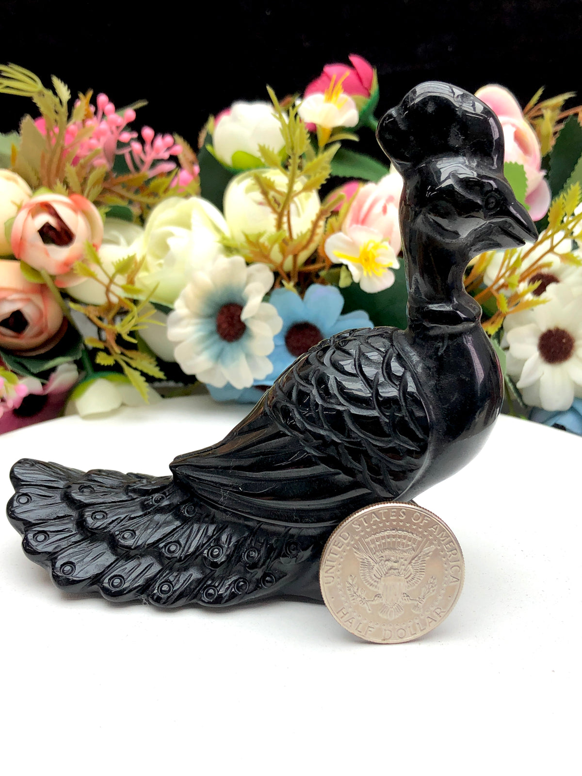black obsidian peacock carvings