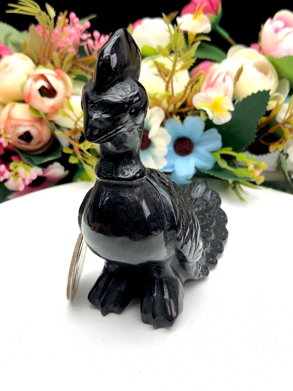 black obsidian peacock carvings