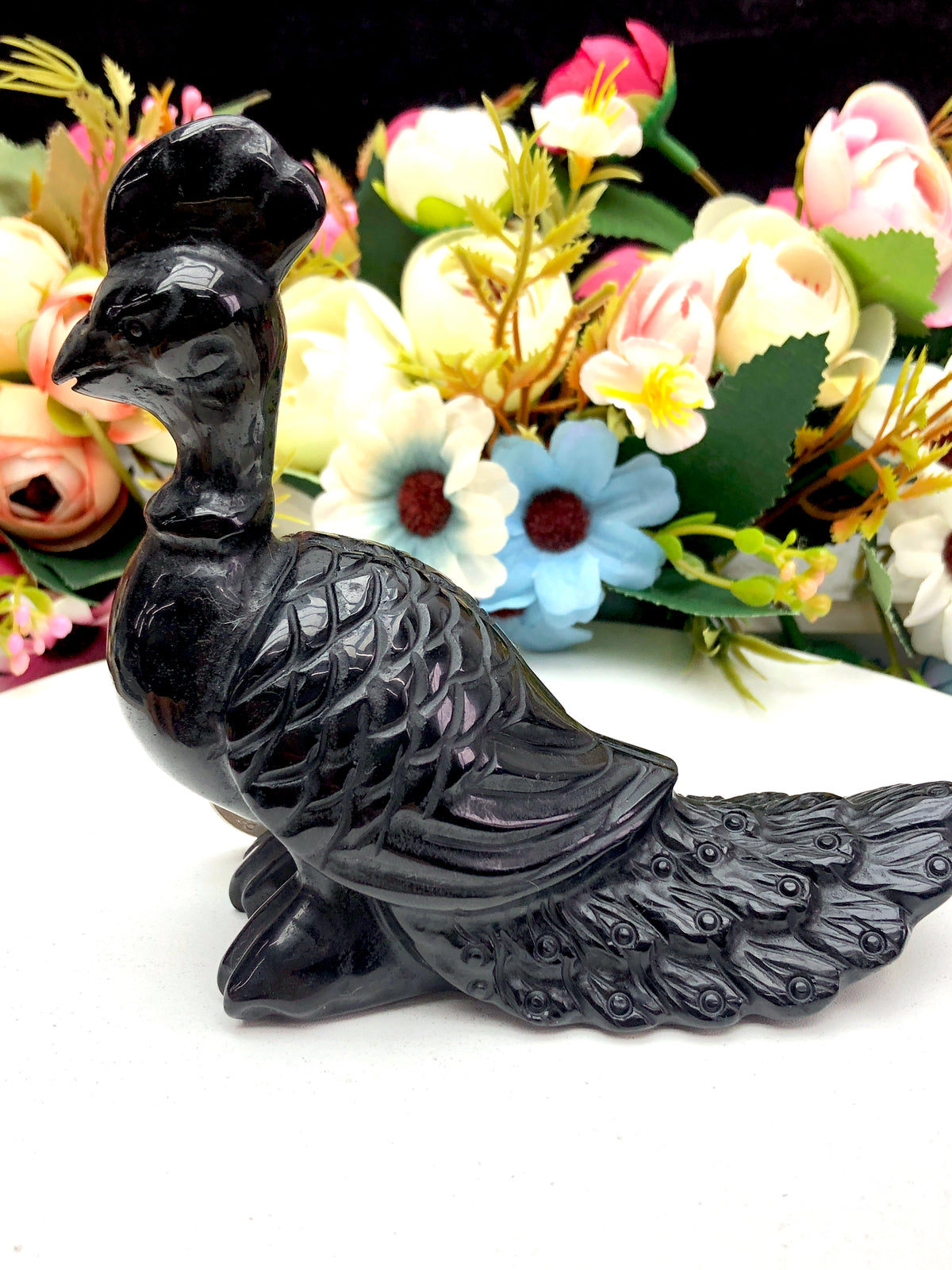 black obsidian peacock carvings