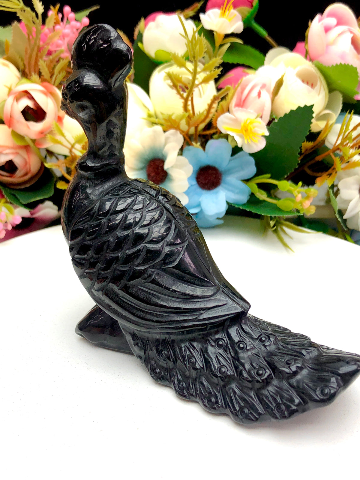 black obsidian peacock carvings