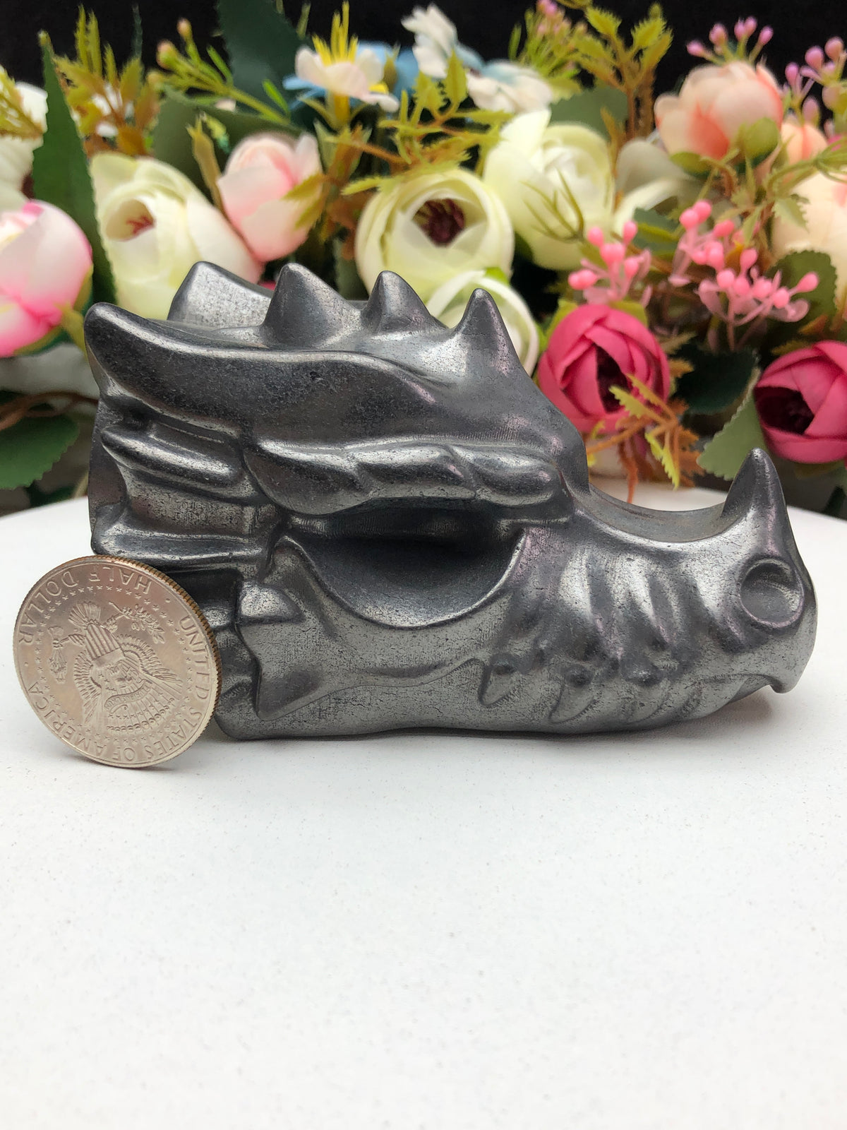 Shungite dragon head carving