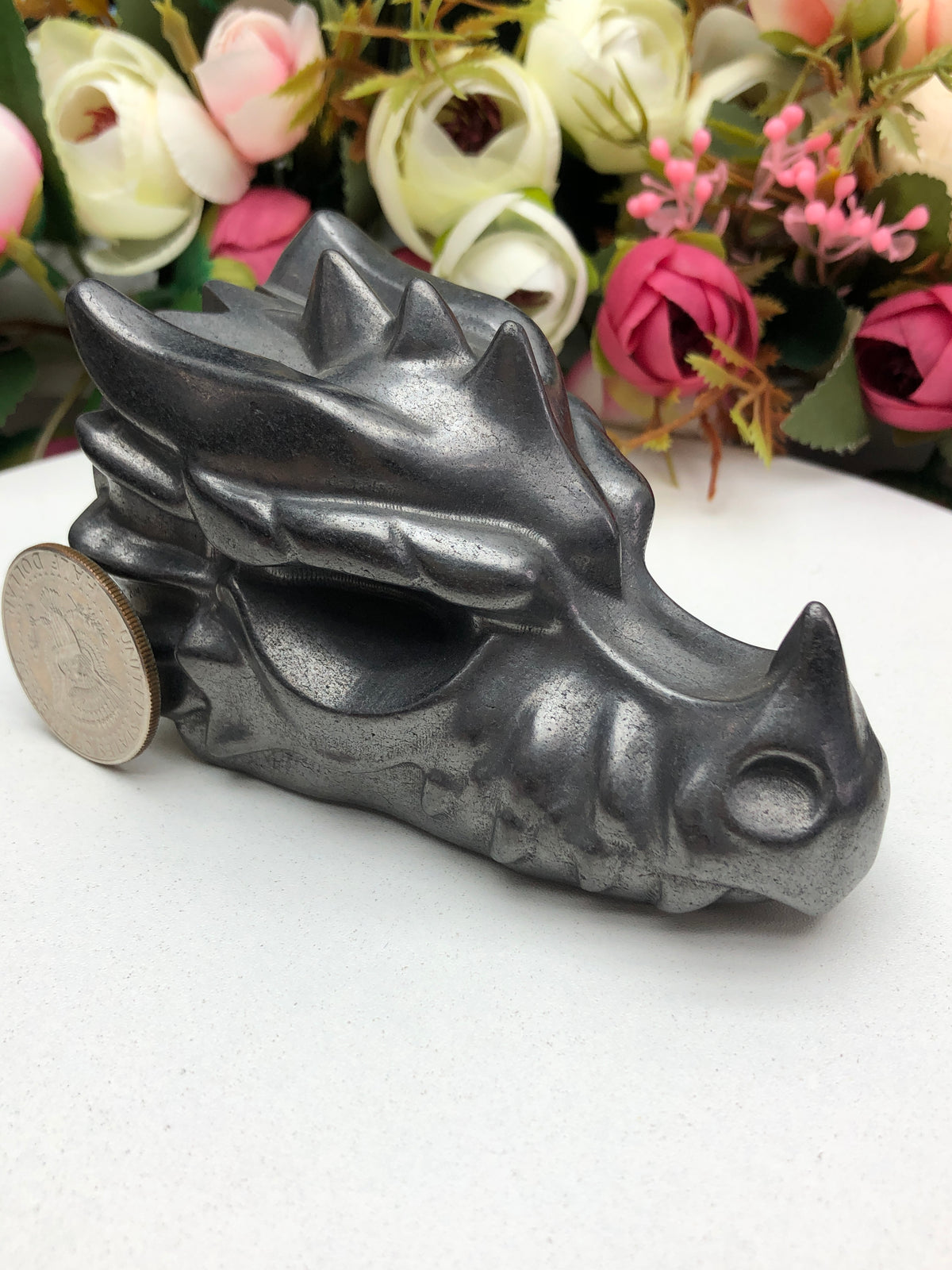 Shungite dragon head carving
