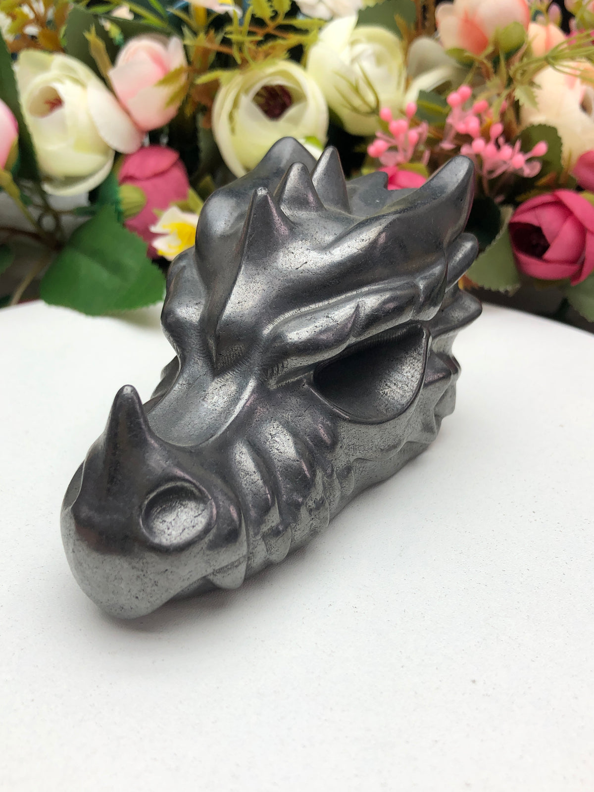 Shungite dragon head carving