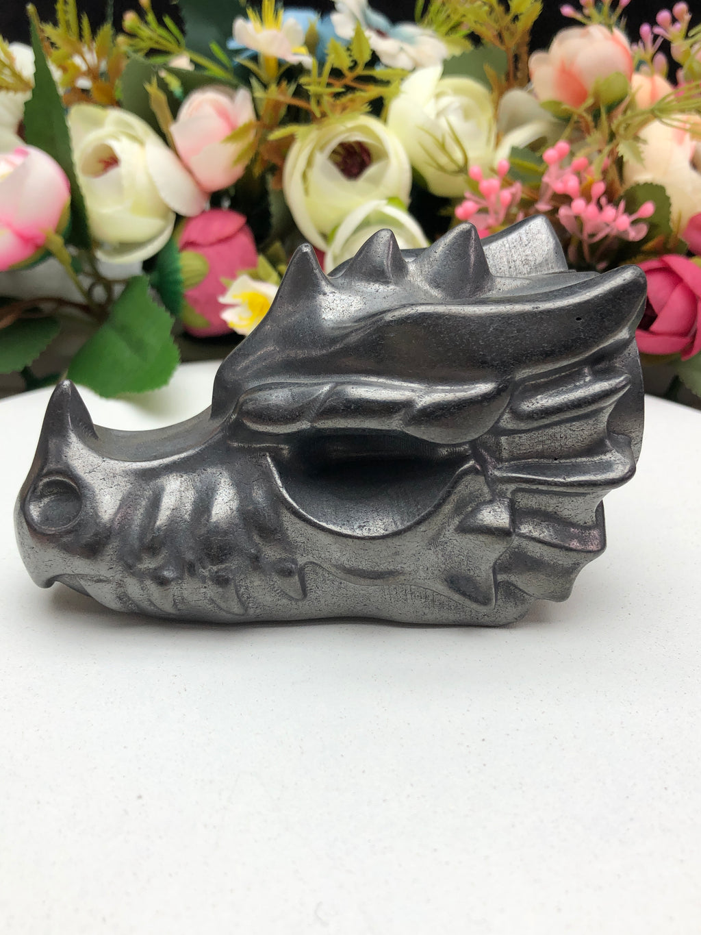 Shungite dragon head carving