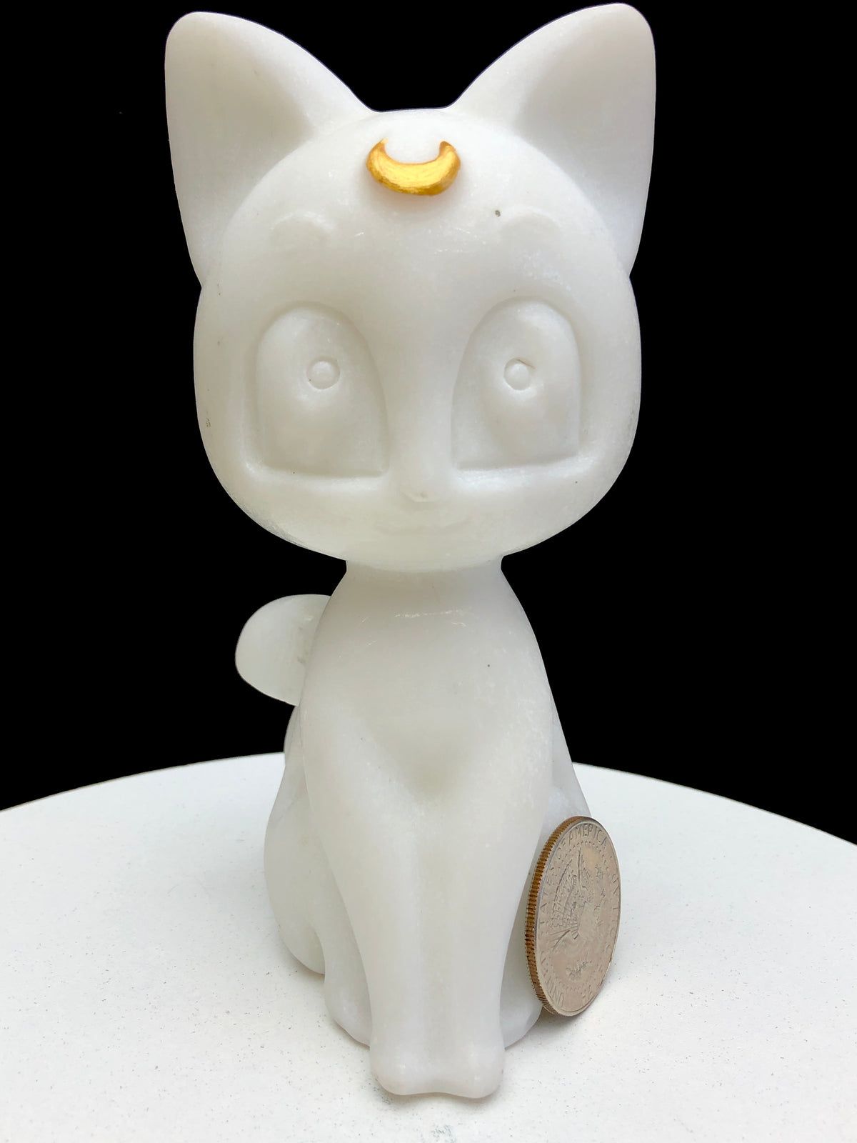 Obsidian/white jade Runa carving