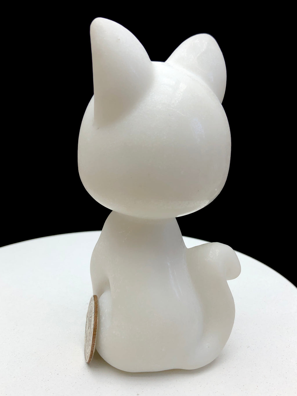 Obsidian/white jade Runa carving