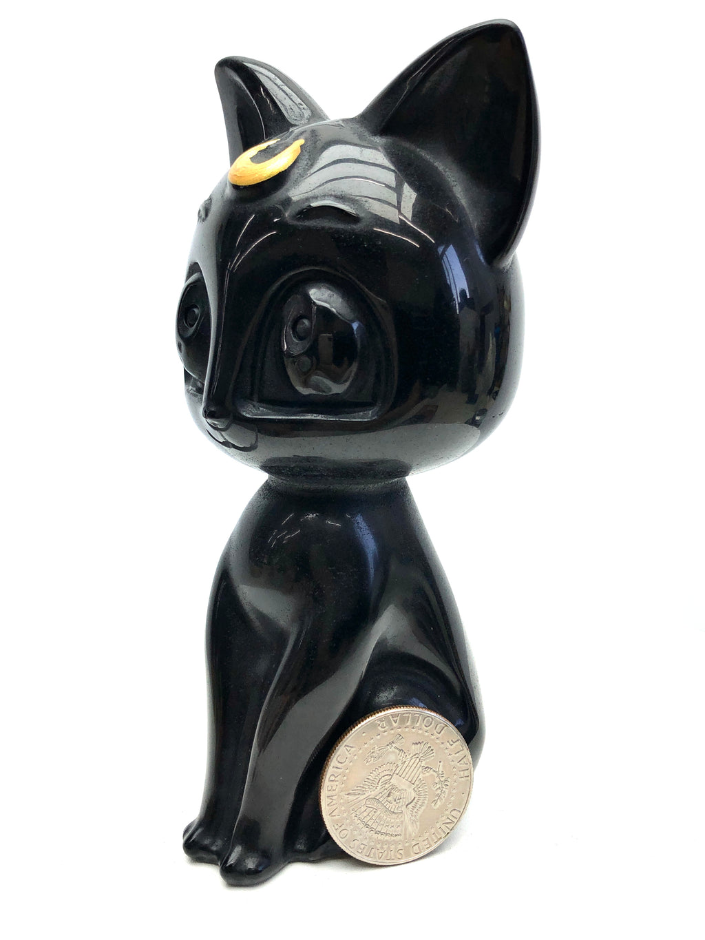 Obsidian/white jade Runa carving