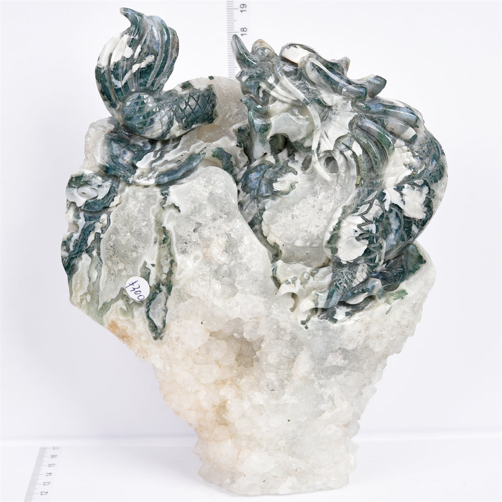 Moss agate with druzy dragon carving