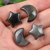 Gold/silver obsidian moon and star carving