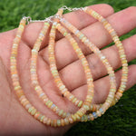 faced drum beads rainbow opal brecelet