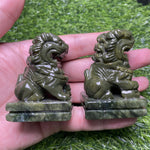 green jade lion carving