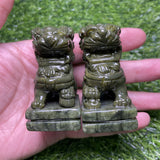 green jade lion carving