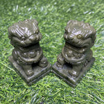 green jade lion carving